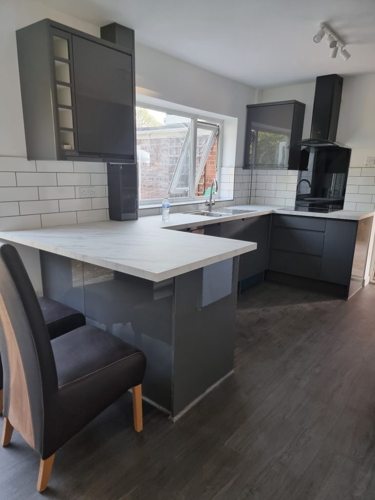 A recently fitted kitchen featuring a modern, sleek design.