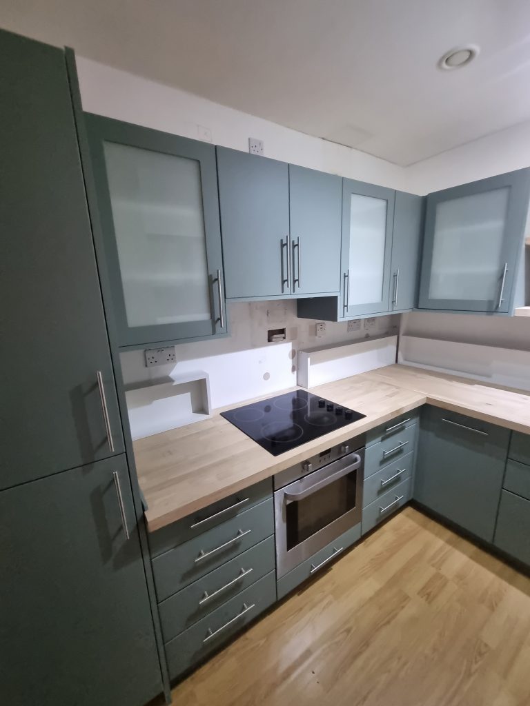 A bespoke kitchen renovation, featuring a modern design.