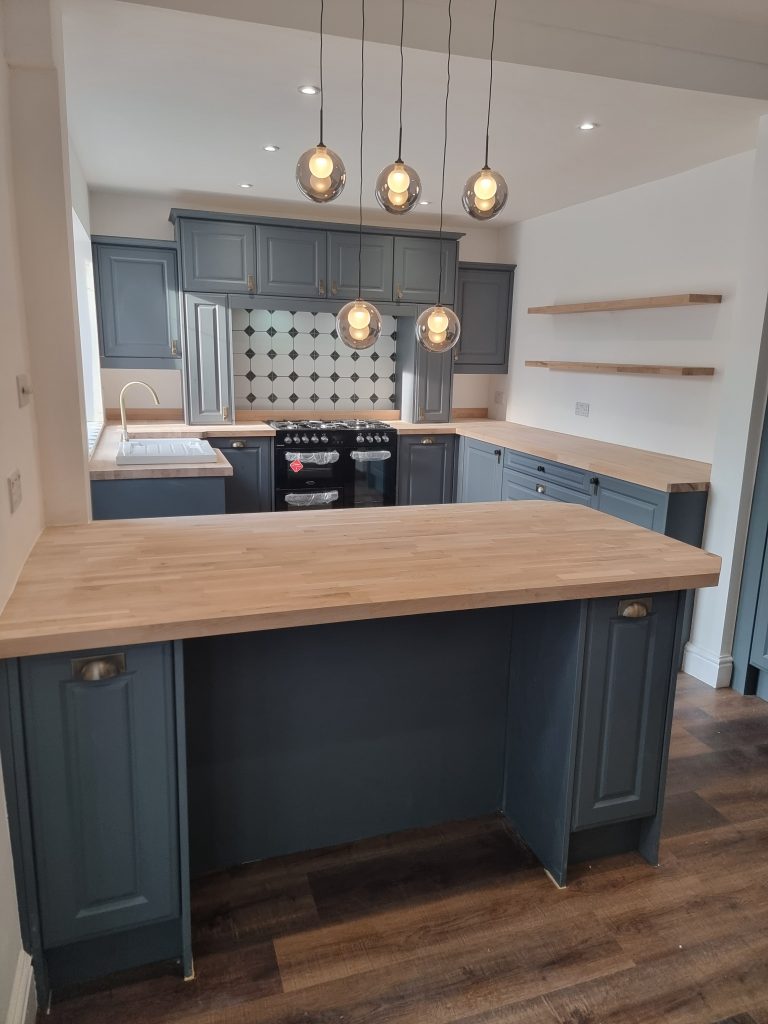A bespoke kitchen renovation, featuring a modern design.